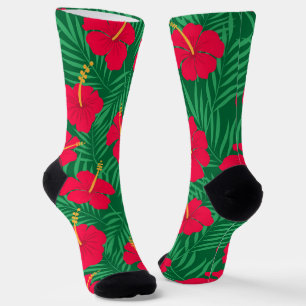 Rote Hibiskusblüten auf grünen tropischen Blättern Socken