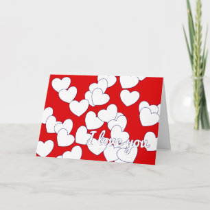 Rote Karte mit weißen Herzen, um 'Ich liebe dich' 
