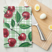 Rote Kirschen auf hellgrünem Gingham Geschirrtuch (Viertel Falte)