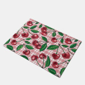 Rote Kirschen auf rosa Gingham Fußmatte (Schrägansicht)