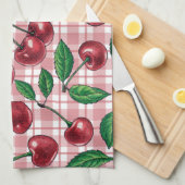 Rote Kirschen auf rosa Gingham Geschirrtuch (Viertel Falte)