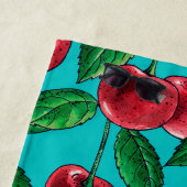 Rote Kirschen auf Türkis Strandtuch (Beispiel)