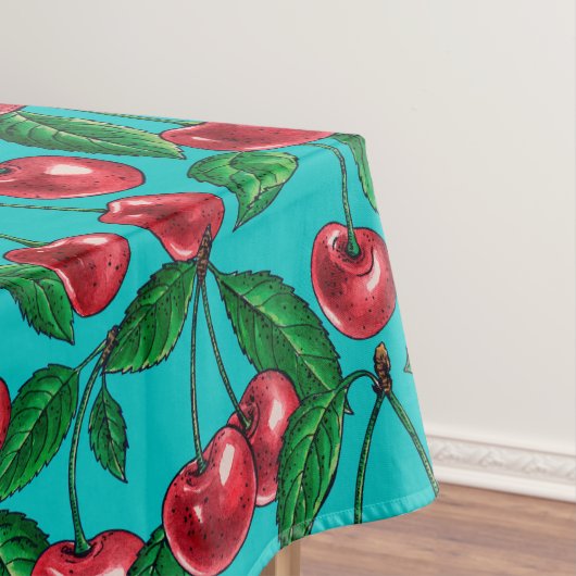 Rote Kirschen auf Türkis Tischdecke (Beispiel)