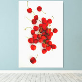 Rote Kirschen auf weißer Seite Leinwanddruck (Insitu (Holzboden))