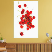 Rote Kirschen auf weißer Seite Leinwanddruck (Insitu (Wohnzimmer))