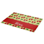 Rote Kirschen aus individuelle Name auf Gelb Schneidebrett (Ecke)