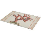 Rote Koralle mit Tritonshorn-Muschel-Grenze Schneidebrett (Ecke)