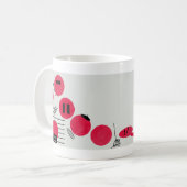 Rote, lustige Brechpunkte auf einer Tasse (Vorderseite Links)