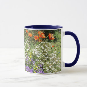 Rote Mohnblumen in der bunten Flowerbed-Fotografie Tasse