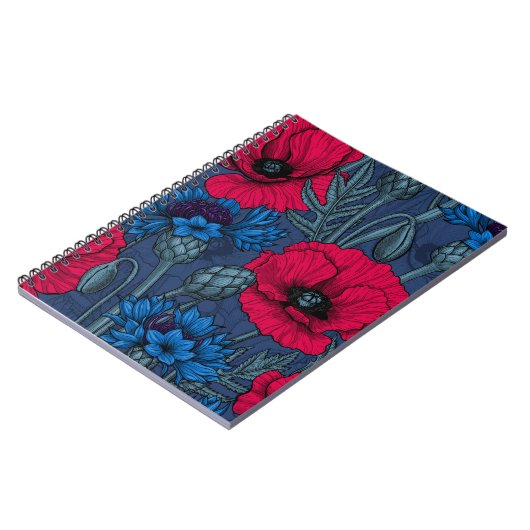 Rote Mohnblumen und blaue Maisblumen auf blau Notizblock (Linke Seite)