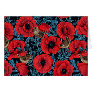 Rote Mohnblüten, blaue Blätter auf schwarz