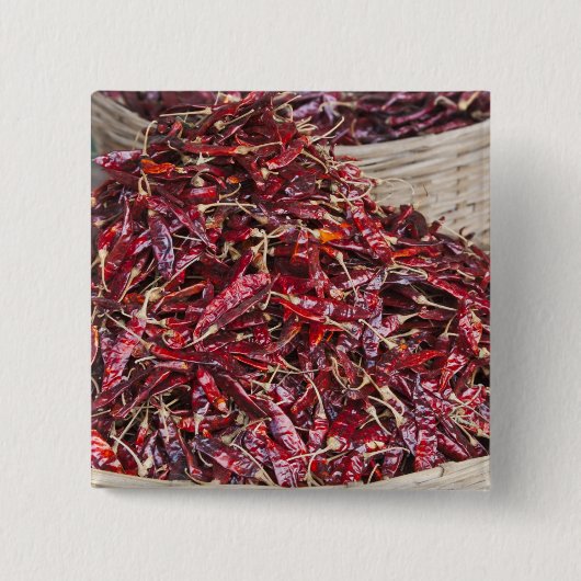 Rote Paprika auf dem lokalen Gemüsemarkt Button (Vorderseite)