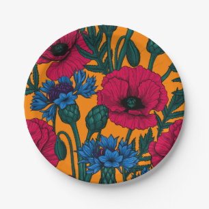 Rote Pfeffer und blaue Kornblumen auf Orange Pappteller