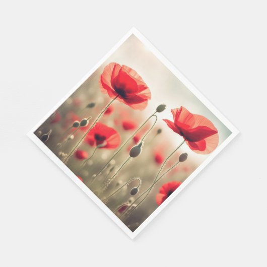 Rote Pflaumen in einem Feld Serviette (Ecke)