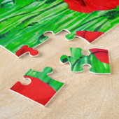Rote Pflücke in einem grünen Feld Puzzle (Seite)