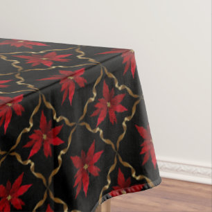 Rote Poinsettias auf Schwarzem Tischdecke