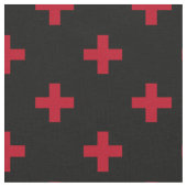 Rote Polka-Kreuze auf schwarz Stoff (Nahaufnahme)