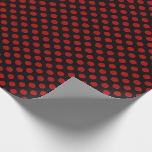 Rote Polka Punkte auf schwarz Geschenkpapier (Ecke)