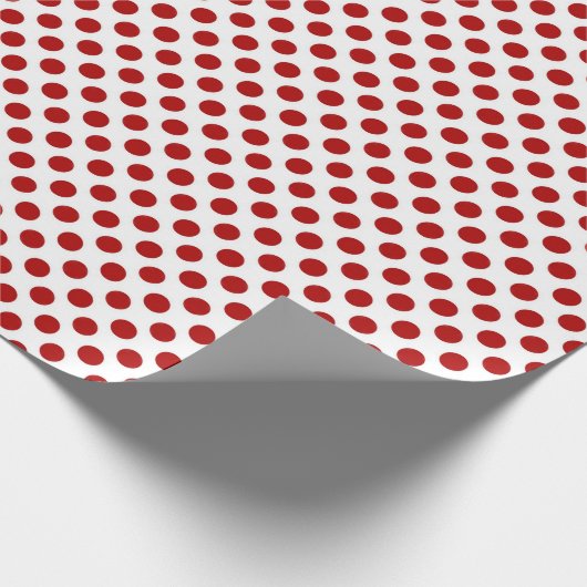 Rote Polka Punkte auf weiß Geschenkpapier (Ecke)