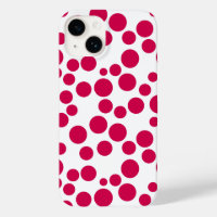 Rote Polka Punkte auf weißem Hintergrund