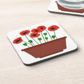 Rote Popkuchen in einem Terracotta Planter Getränkeuntersetzer (Linke Seite)