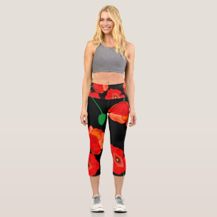 Rote Poppies auf der schwarzen Hintergrunddarstell Capri Leggings