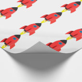 Rote Raketenexplosion aus Geschenkpapier (Ecke)
