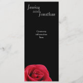 Rote Rose auf der schwarzen Programmkarte Programm (Vorderseite)