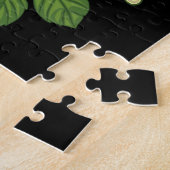 Rote Rose und Gänseblümchen vor schwarzem Hintergr Puzzle (Seite)