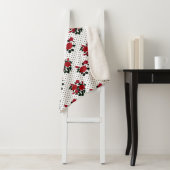 Rote Rosen auf einem Polka Dot Hintergrund. Sherpadecke (Beispiel)