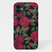 Rote Rosen auf schwarz.