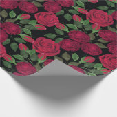 Rote Rosen auf schwarz. Geschenkpapier (Ecke)