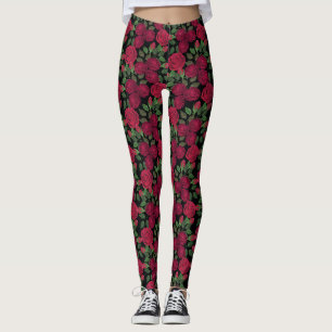 Rote Rosen auf schwarz. Leggings