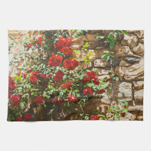 Rote Rosen gegen eine Steinmauer Geschirrtuch