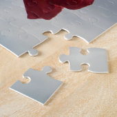 Rote Rosen gegen einen hellen blauen Himmel Puzzle (Seite)