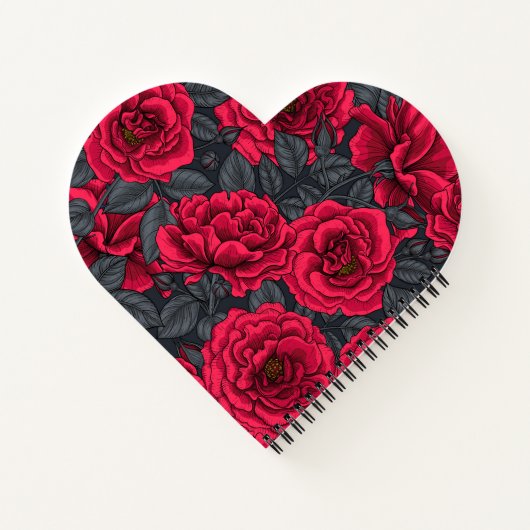 Rote Rosen mit grauen Blätter auf schwarz Notizblock (Rückseite)