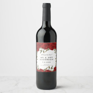 rote Rosen und Grünpflanzen Hochzeitsflasche Weinetikett