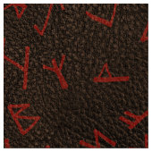 Rote Runenbriefe auf dunklem (simuliertem) Leder Stoff (Nahaufnahme)