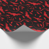 Rote Schläger und Blättermuster Geschenkpapier (Ecke)