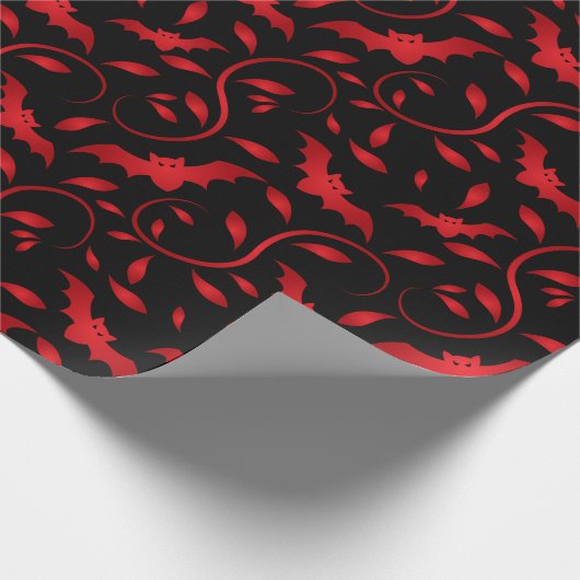 Rote Schläger und Blättermuster Geschenkpapier (Ecke)