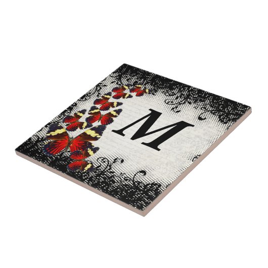 Rote Schmetterlinge auf schwarzer Spitze Fliese (Seite)