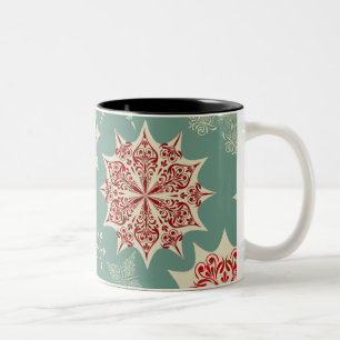 Rote Schneeflocken auf grünem Hintergrund Zweifarbige Tasse