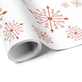 Rote Schneeflocken im Weißbuch Geschenkpapier (Rolleneckpunkt)