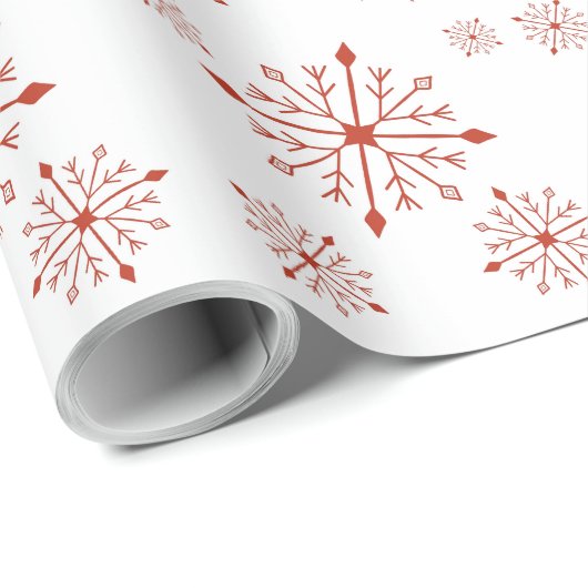 Rote Schneeflocken im Weißbuch Geschenkpapier (Rolleneckpunkt)