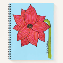 Rote Sternblume mit blauem Hintergrund Notizblock