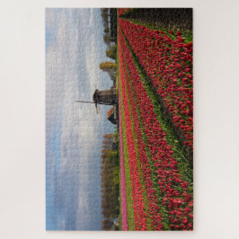 Rote Tulpen und eine Windmühle im Frühjahr Puzzle