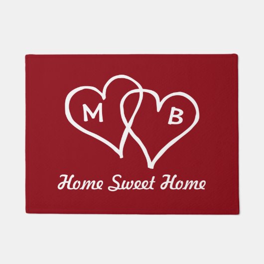 Rote Türmatte mit ineinander greifenden Herzen und (Vorderseite)