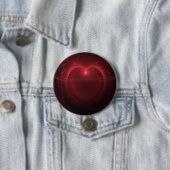 Rote Umrandung beleuchtetes Herz über schwarzer Gr Button (Beispiel)