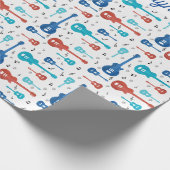 Rote und blaue Gitarren Geschenkpapier (Ecke)