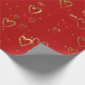 Rote und goldene Herzen am roten Valentiner Muster Geschenkpapier (Ecke)